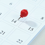 calendar with red pin on 14