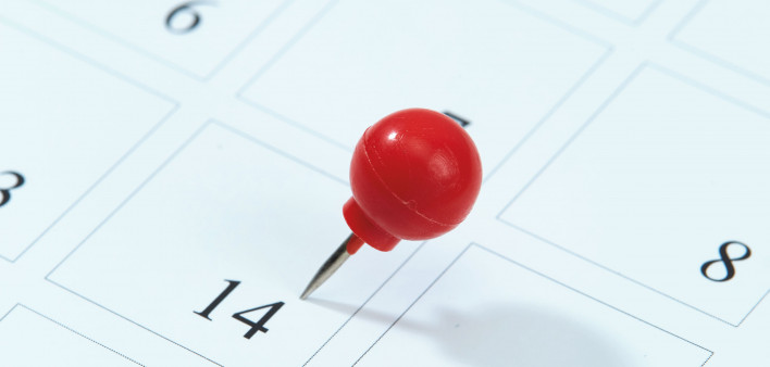 calendar with red pin on 14