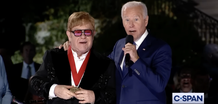 President Biden surprises Elton John with the National Humanities Medal for his HIV advocacy, September 23, 2022.