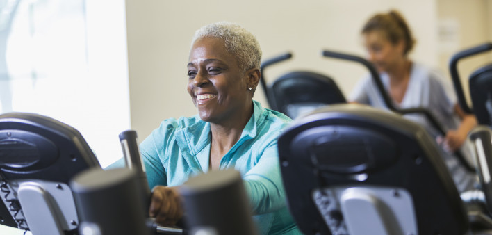 older woman on exercise bike