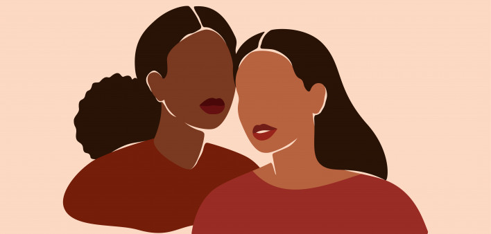 Two beautiful black women stand together. Strong African American girls side by side. Sisterhood and females friendship.