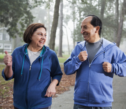 Latino couple jogging
