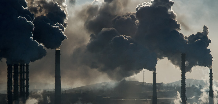 Ecological catastrophy smokestacks billowing smoke