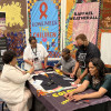 From left: Dafina Ward of Southern AIDS Coalition, Jada Harris and Duane Cramer of the AIDS Memorial Quilt, Elisa Woods of Brown Sugar Stitchers Quilt Guild and Shanell McGoy of Gilead Sciences