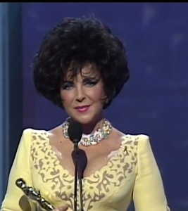 Elizabeth Taylor receives the Jean Hersholt Humanitarian Award at the 1993 Academy Awards