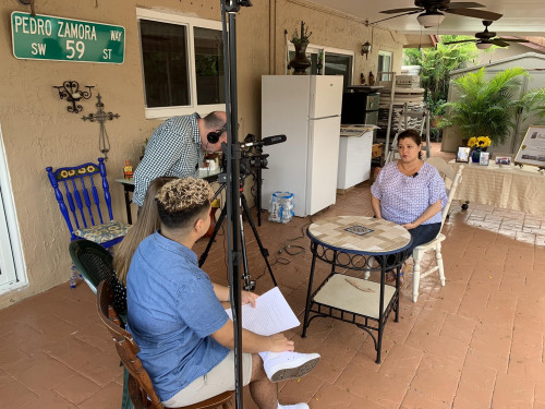 The documentary crew interview Pedro Zamora's sister Mily.