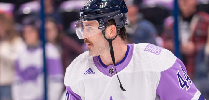 Erik Gudbranson of the Columbus Blue Jackets Blue shows off a mustache for Hockey Fights Cancer.