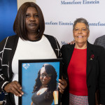 Miriam Nieves (in red) with family members of donor Brittany Newton and the medical team at Montefiore