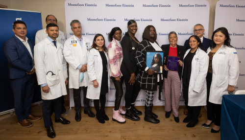 From left: Bridgette Newton with a photo of heart donor Brittany Newton, transplant recipient Miriam Nieves and her husband, Julio Pagan