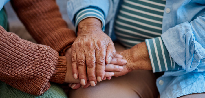hands together three generations women