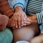 hands together three generations women