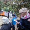 Gert McMullin, mother of the AIDS Memorial Quilt, leads a community reading of names in the Circle of Friends at the National AIDS Memorial Grove on World AIDS Day.  The names being read are newly engraved this year within the memorial and also of newly c