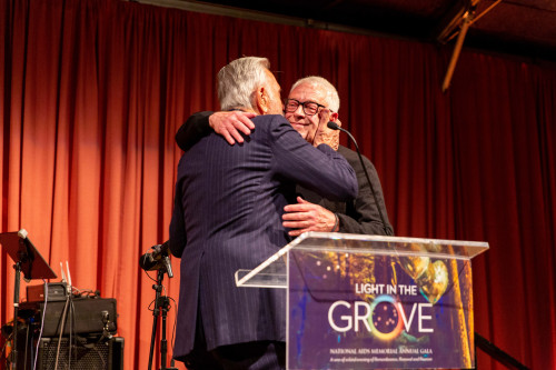Cleve Jones (R), founder of the AIDS Memorial Quilt, receives the Lifetime of Commitment Award from former San Francisco mayor Art Agnos (L) at the National AIDS Memorial Light in the Grove Gala during World AIDS Day observances and tributes.