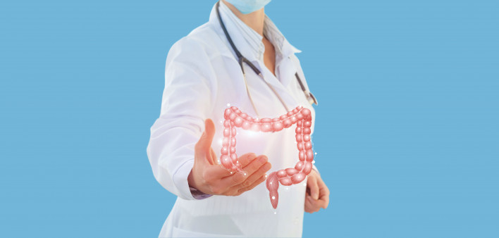 doctor holding a virtual intestine illustration