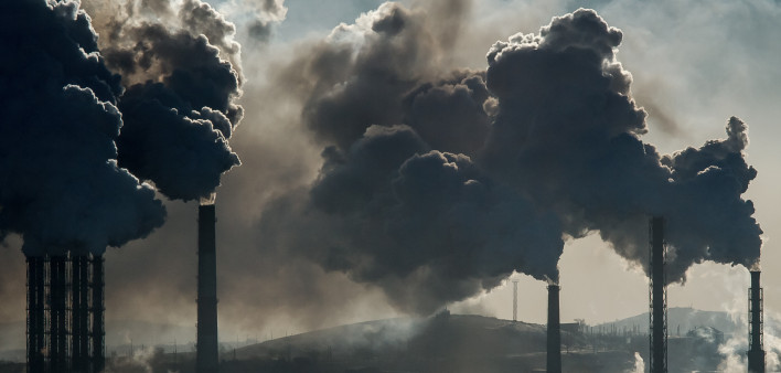 Ecological catastrophy smokestacks billowing smoke