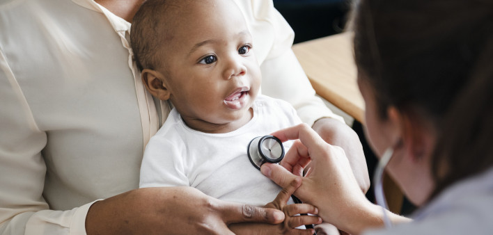 baby and doctor stethoscope
