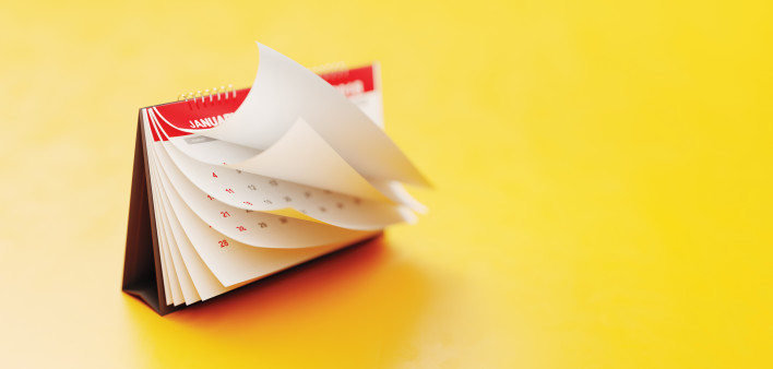 red calendar on yellow background