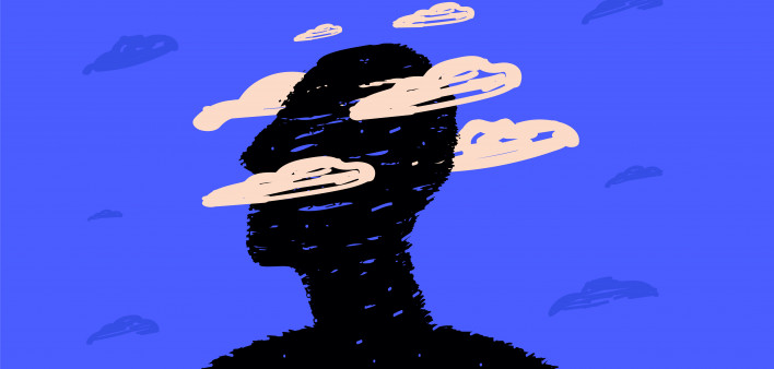 A black silhouette of a head surrounded by clouds, a symbol of postcovid syndrome, brain fog
