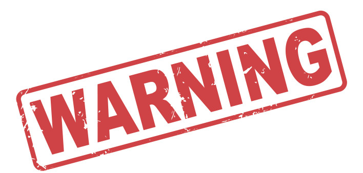 Stamp warning with red text on white