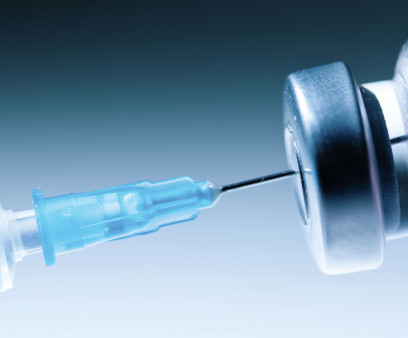Medical syringe with a needle and a bollte with vaccine