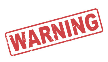 Stamp warning with red text on white