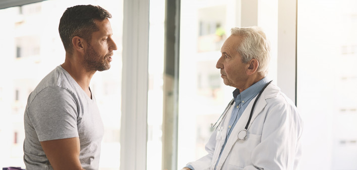Cropped shot of a senior doctor giving his male patient a thorough checkup during his consultation