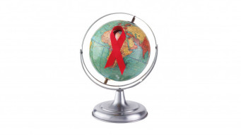 Globe red ribbon world aids day