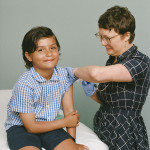 boy receives a vaccine