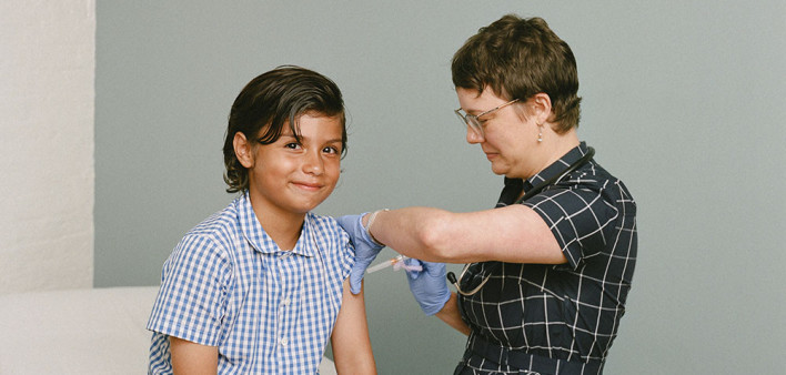 boy receives a vaccine