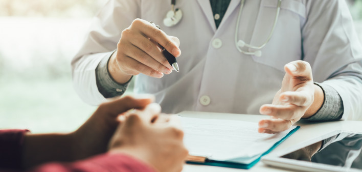 Doctor talking to the patient about menopause and treatment in future.