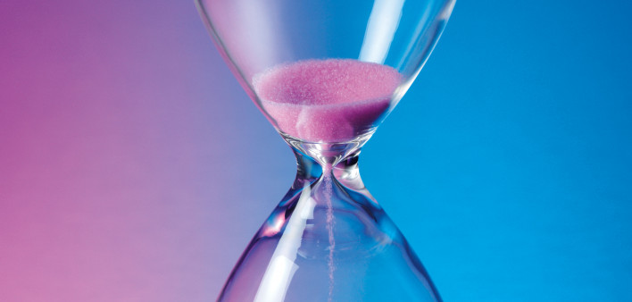 Hourglass with pink sand