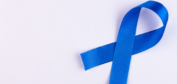 Blue ribbon on a white background. Colon cancer