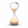 an hourglass with sand running downwards
