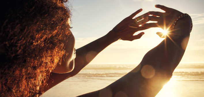 woman sun rise hands out happy