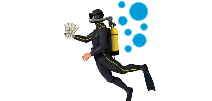 scuba diver holding money