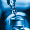 vaccine needle going into syringe