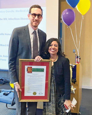 Ward 86 Medical Director Monica Gandhi receives  a state proclamation from California Senator Scott Wiener