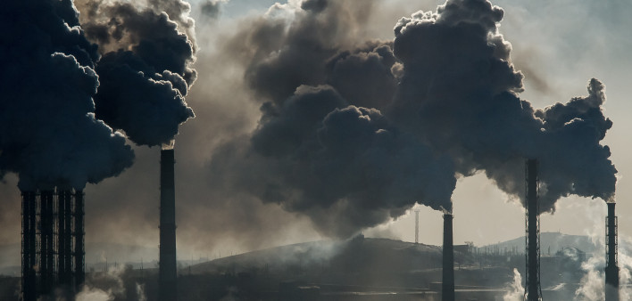 Ecological catastrophy smokestacks billowing smoke
