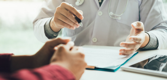 Doctor talking to the patient about menopause and treatment in future.