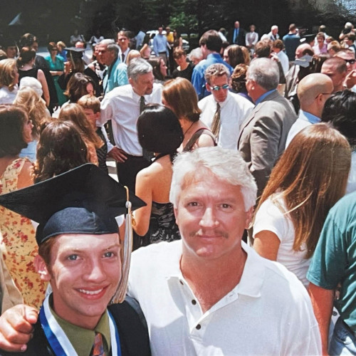 Michael Michael with his dad, Mark, at his 2004 graduation