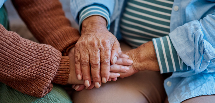 hands together three generations women