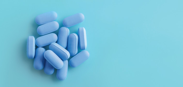 pile of blue pills PrEP Pre Exposure Prophylaxis