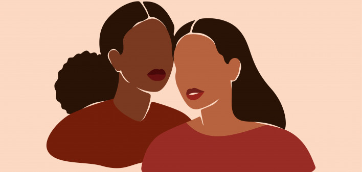 Two beautiful black women stand together. Strong African American girls side by side. Sisterhood and females friendship.