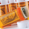 money in pill bottles