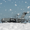 Fire-retardant foam temporarily covered a small portion of the flight line at Travis Air Force Base in California after it was released inside a hangar on Sept. 24, 2013.