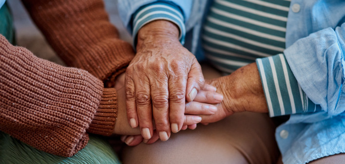 hands together three generations women