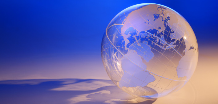 a transparent globe casting a shadow