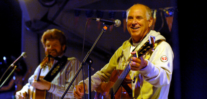 Jimmy Buffett, right, performs for U.S. sailers in the Middle East in 2008.
