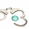 handcuffs and a blue condom