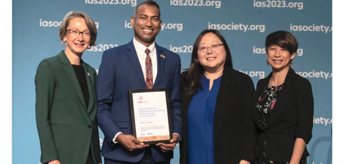 Vamsi Vasireddy, MD, DrPh, (second from left) received a prize for research in long-acting HIV prevention and treatment in Uganda.